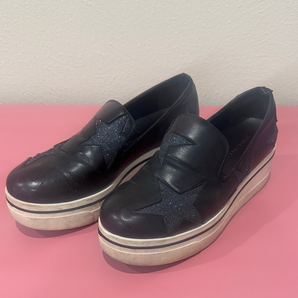 Stella McCartney Black Star Slip-On Shoes